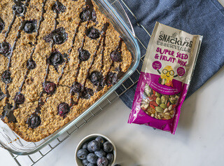 <p>Fold in the blueberries and pour the mixture into the prepared baking dish; top with more blueberries if desired.</p>