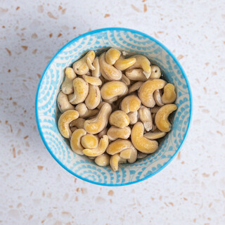 <p><strong>Make the Cashew Cream:</strong> Blend soaked cashews, maple syrup, almond milk, vanilla extract, and cinnamon until smooth. Add more milk if necessary.<br /><br /></p>